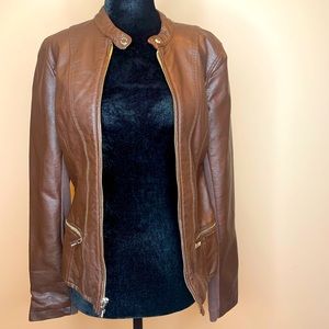 Express brown leather jacket with soft fabric and gold zipper detailing.